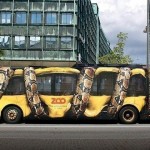Реклама зоопарка на автобусе в Нью-Йорке….